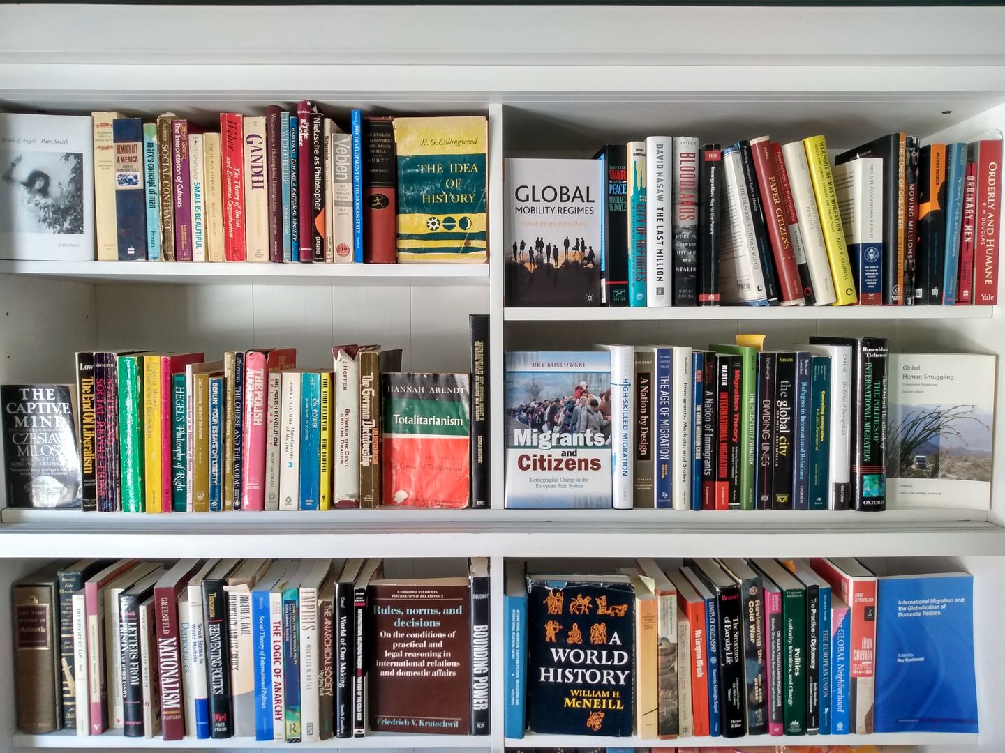 A shelf of books by authors who have influenced Rey Koslowski's thinking